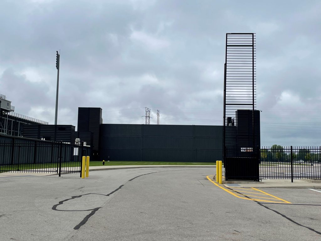metal vertical lift gate fully raised to open position