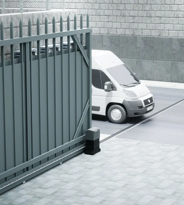 White van passing through slide gate.