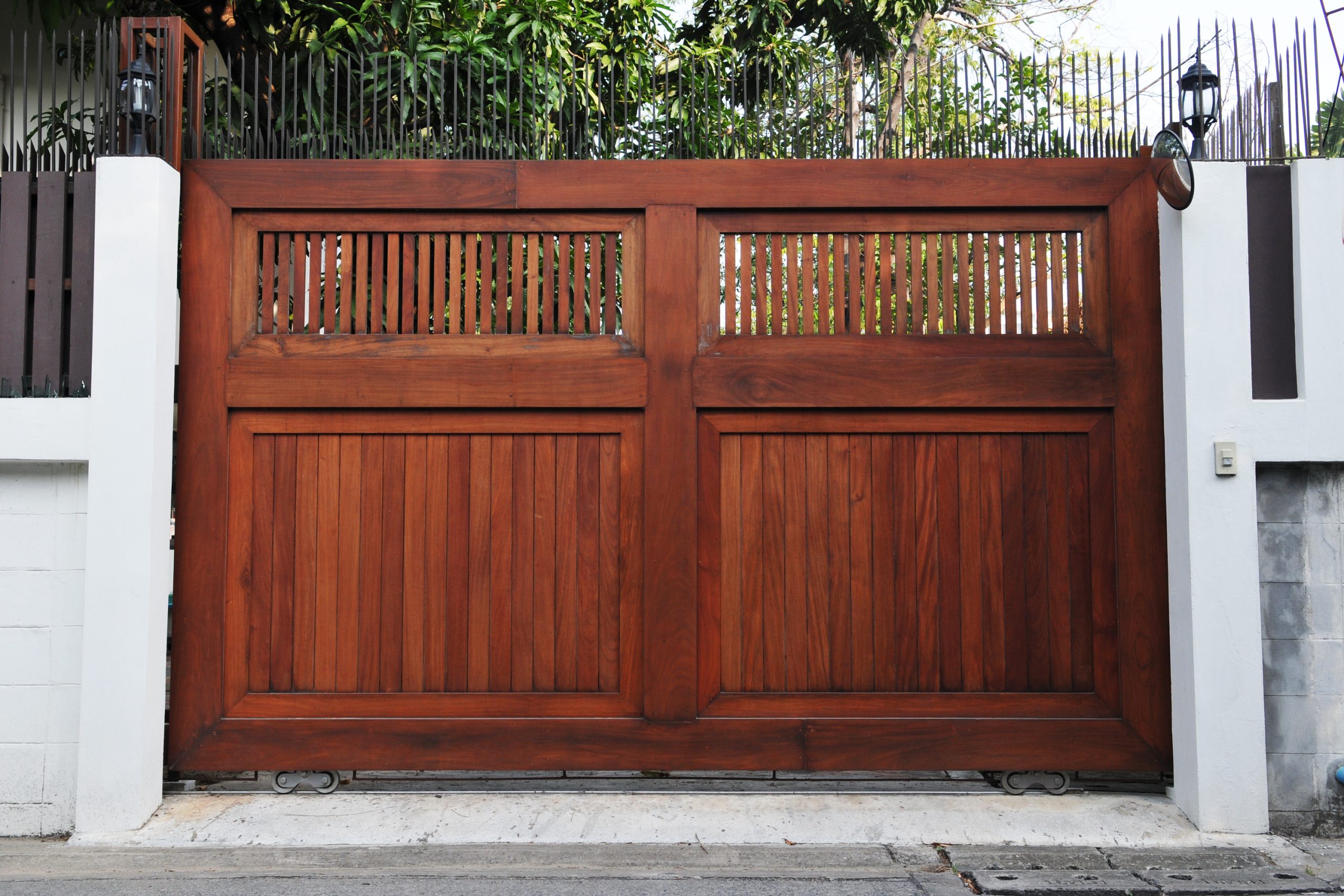 Wooden slide gate for residence.